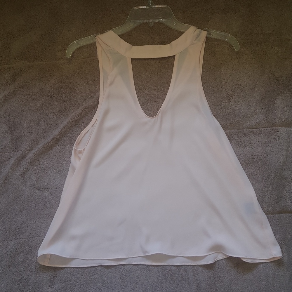 Cream with a pink tint blouse